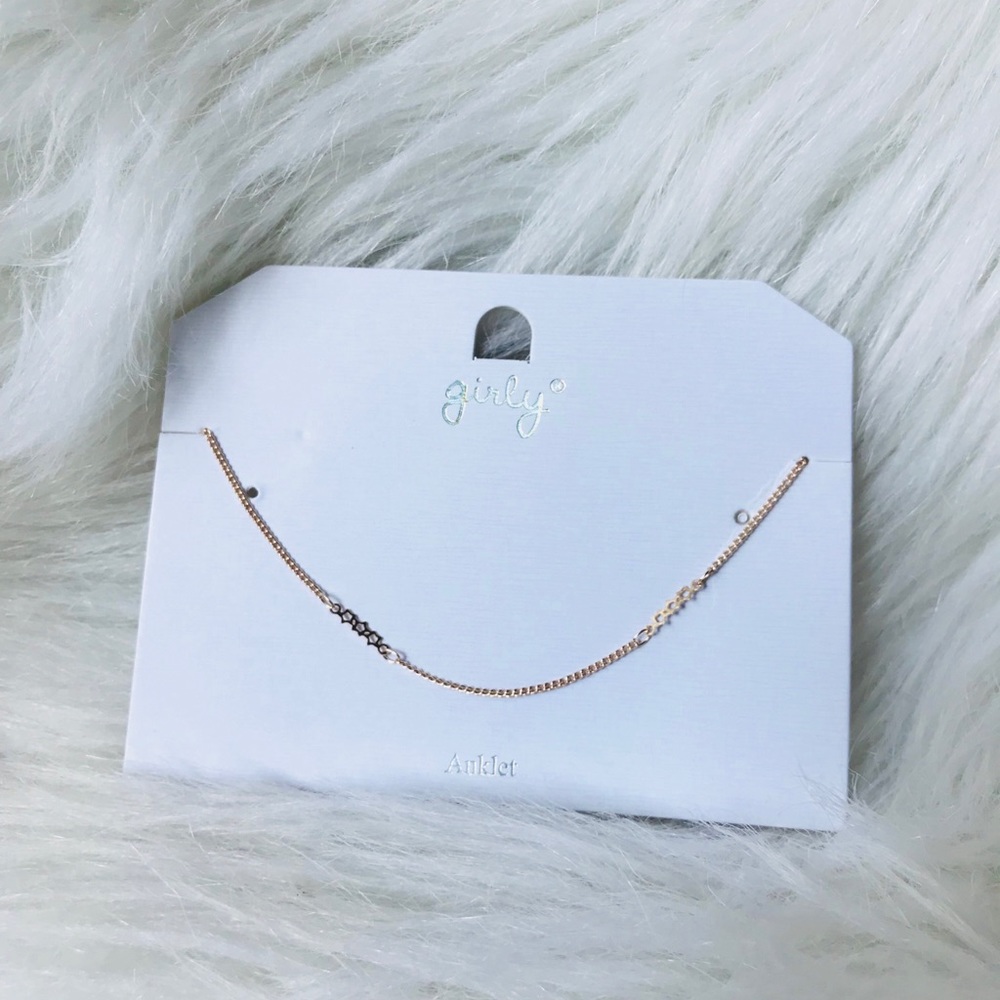 Dainty gold anklet with 3 etched stars.